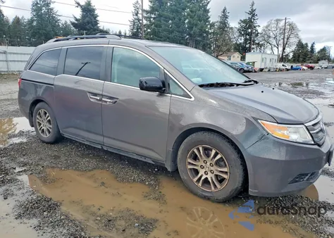 2012 Honda Odyssey Exl z USA, uszkodzony, nr VIN 5FNRL5H66CB083962